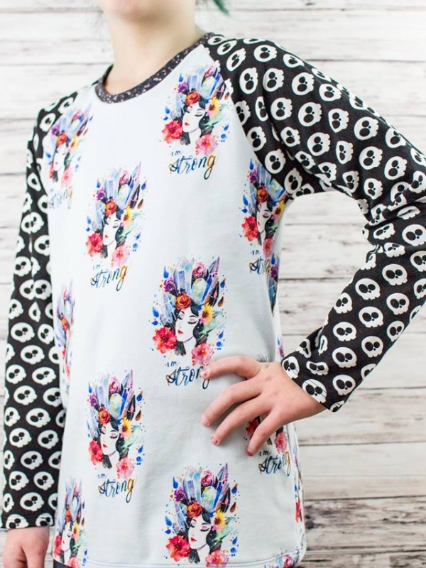 Shown is a tween girl wearing the Essential